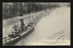 Les bords de la Seine : un remorqueur à Puteaux