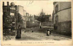 Carte postale ancienne Rue Ravignan — Au coin de la rue d'Orchamps
                                                                     à Paris 18e
                                
