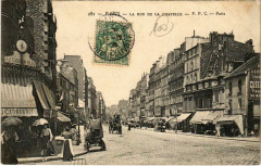 Carte postale ancienne La Rue de la Chapelle
                                                                     à Paris 18e
                                