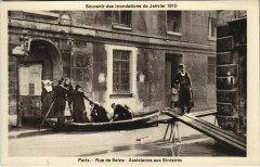 Carte postale ancienne Paris 6e - Rue de Seine - Assistance aux Sinistrés
                                                                     à Paris
                                