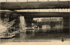 Paris Inondation 1910. Rue Proud'hon sous le P-L-M à Paris