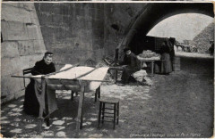 Paris métiers. Cardeurs a l'ouvrage sous le Pont-Marie