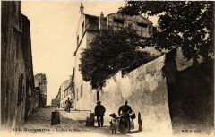 Carte postale ancienne Montmartre - La Rue du Mont-Cenis
                                                                     à Paris 18e
                                