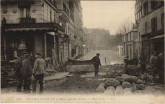 Carte postale ancienne Inondations de Paris - Rue Gros
                                                                     à Paris 16e
                                