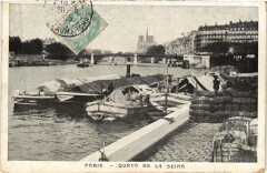 Carte postale ancienne Les Bords de la Seine
                                                                     à Paris 4e
                                