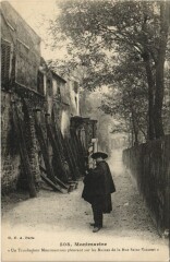 Carte postale ancienne Montmartre - Un Troubadour Montmartrois pleurant sur les ruines de la rue Saint-Vincent
                                                                     à Paris 18e
                                