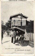 Carte postale ancienne Les petits métiers parisiens - La Marchande de Jouets
                                                                     à Paris 19e
                                