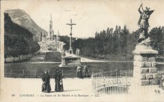 La Statue de Saint-Michel et la Basilique -
																					65100 Lourdes
																			