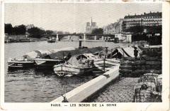 Carte postale ancienne Les Bords de la Seine
                                                                     à Paris 4e
                                