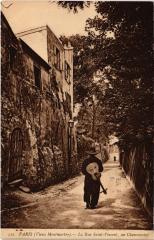 Carte postale ancienne Vieux Montmartre - La Rue Saint-Vincent - Un chansonnier
                                                                     à Paris 18e
                                