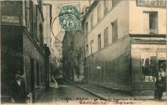 Carte postale ancienne La Rue Saint-Rustique à Montmartre
                                                                     à Paris 18e
                                