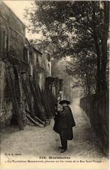 Carte postale ancienne Montmartre - Un Troubadour Montmartrois pleurant sur les ruines de la rue Saint-Vincent
                                                                     à Paris 18e
                                