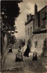 Carte postale ancienne Vieux Montmartre - La Rue du Mont-Cenis
                                                                     à Paris 18e
                                