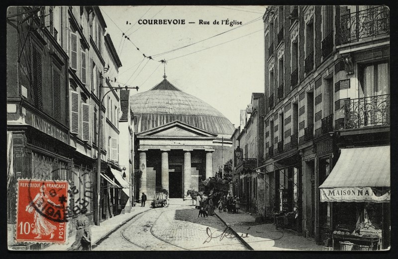Carte postale ancienne Rue de l'Eglise à Courbevoie