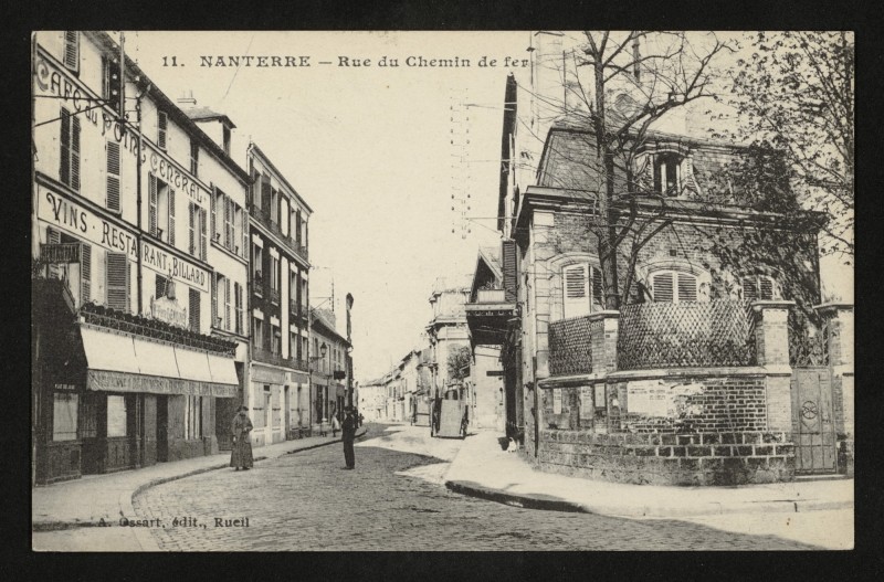 Carte postale ancienne La Rue du Chemin de fer à Nanterre