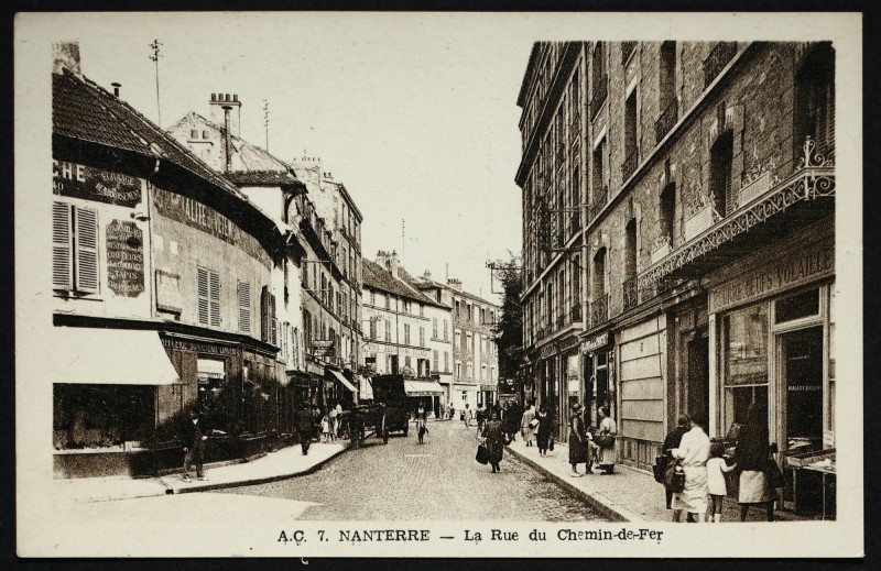 Carte postale ancienne La rue du Chemin-de-Fer à Nanterre