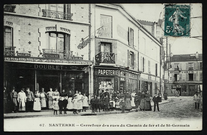 Carte postale ancienne Carrefour des rues du Chemin-de-Fer et de St-Germain. à Nanterre