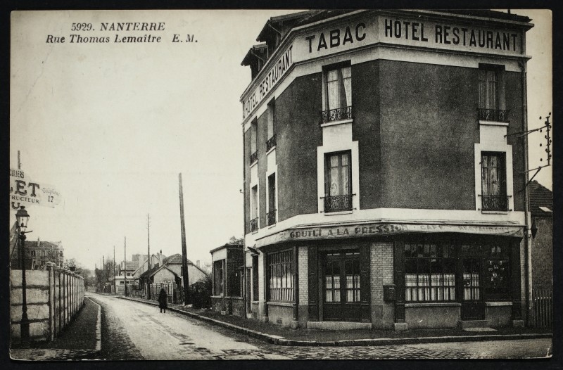 Carte postale ancienne Hôtel-restaurant-tabac rue Thomas-Lemaître à Nanterre