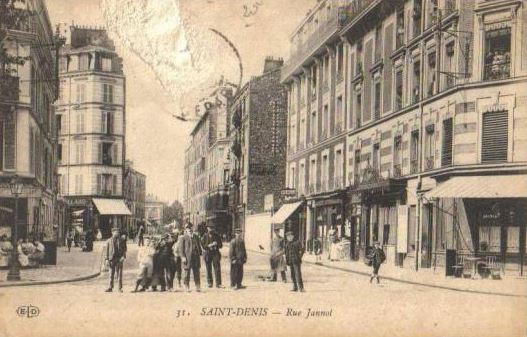 Carte postale ancienne Saint-Denis.Rue Gaston-Philippe.Rue Jannot.Groupe