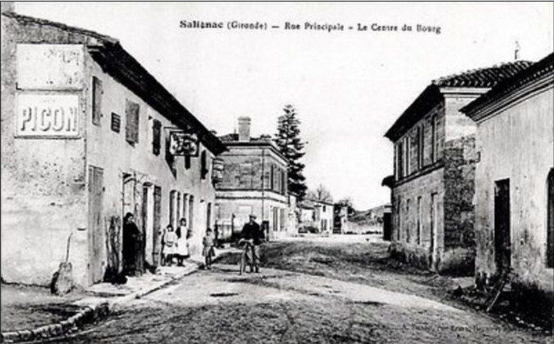 Carte postale ancienne Salignac - rue principale 3