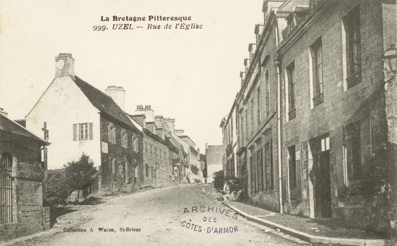Carte postale ancienne Uzel - Rue de l'Eglise à Uzel