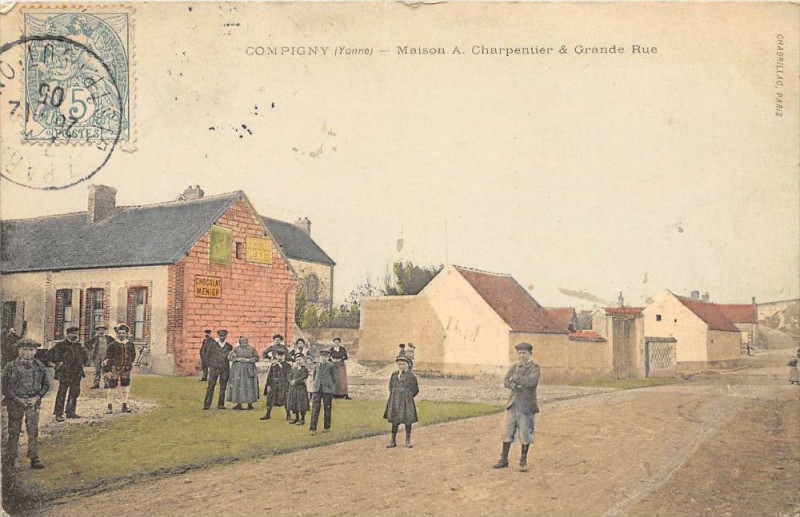 Carte postale ancienne Compigny Maison A.charpentier Et Grande Rue à Compigny