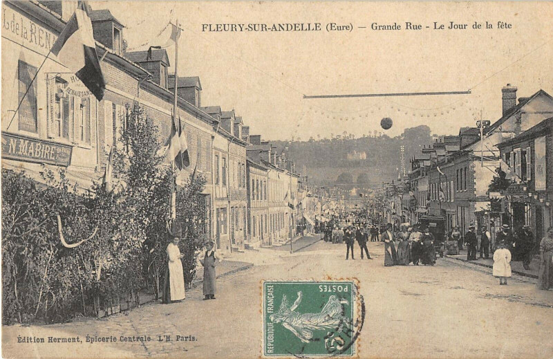 Carte postale ancienne Fleury Sur Andelle Grande Rue Le Jour De La Fete (cliché pas courant à Fleury-sur-Andelle