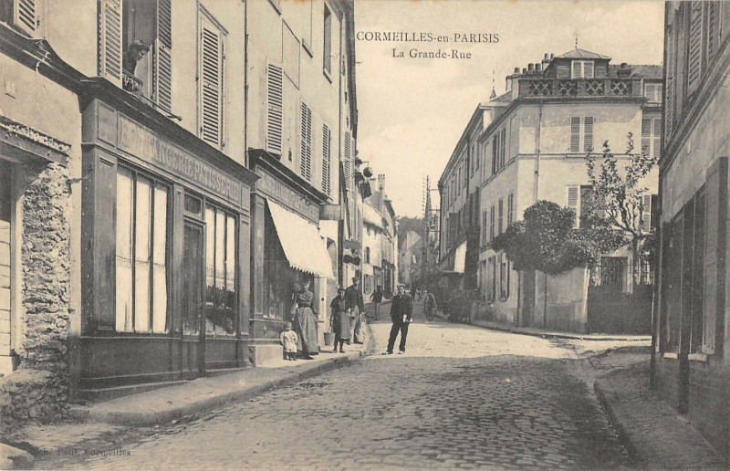 Carte postale ancienne Cormeilles En Parisis La Grande Rue à Cormeilles-en-Parisis