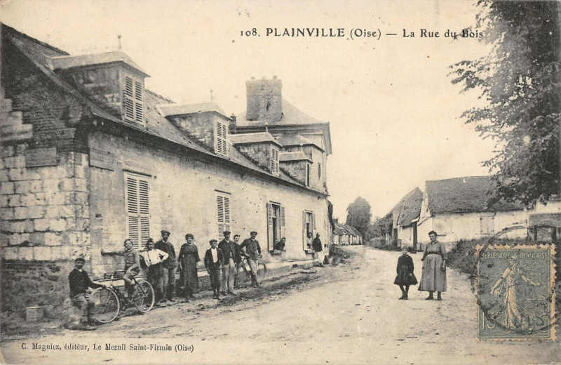 Carte postale ancienne Plainville La Rue Du Bois à Plainville