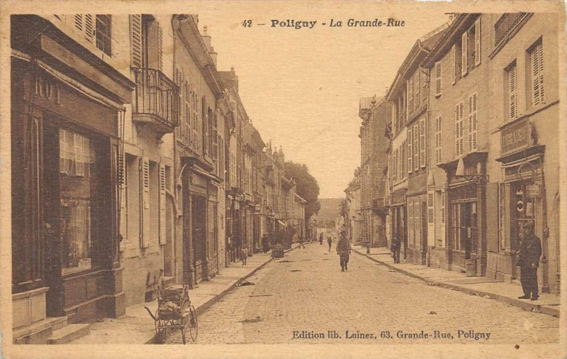 Carte postale ancienne Poligny La Grande Rue à Poligny