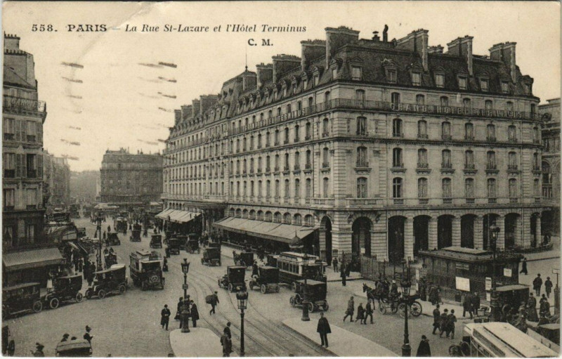 Carte postale ancienne Paris 9e - La Rue Saint-Lazare et l'Hotel Terminus à Paris 9e