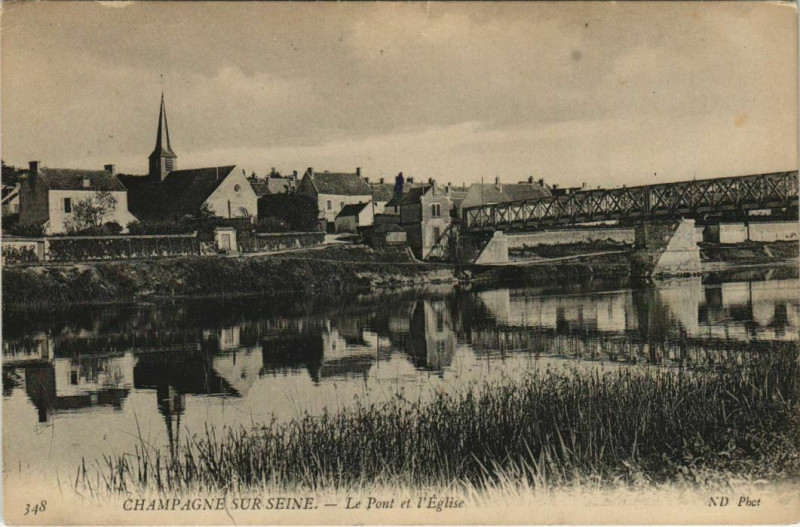 Carte postale ancienne Champagne-sur-Seine Le Pont et l'Eglise à Champagne-sur-Seine