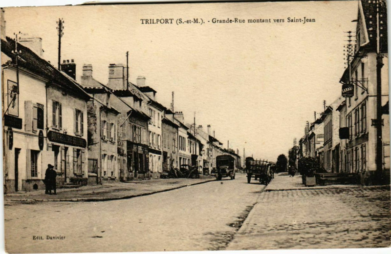 Carte postale ancienne Trilport - Grande-Rue montant vers Saint-Jean  à Trilport
