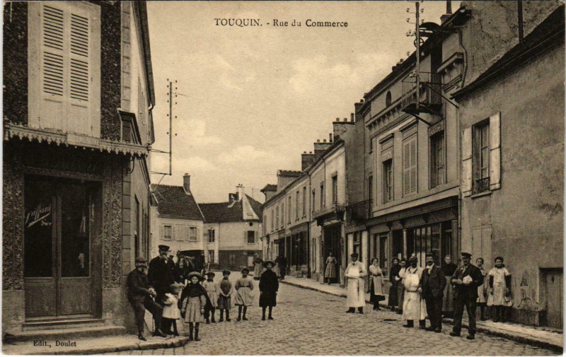 Carte postale ancienne Touquin Rue du Commerce à Touquin