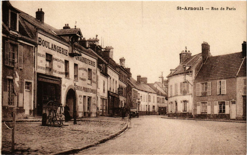 Carte postale ancienne Saint-Arnoult - Rue de Paris
