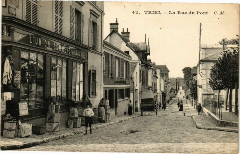Carte postale ancienne Triel - La Rue du Pont