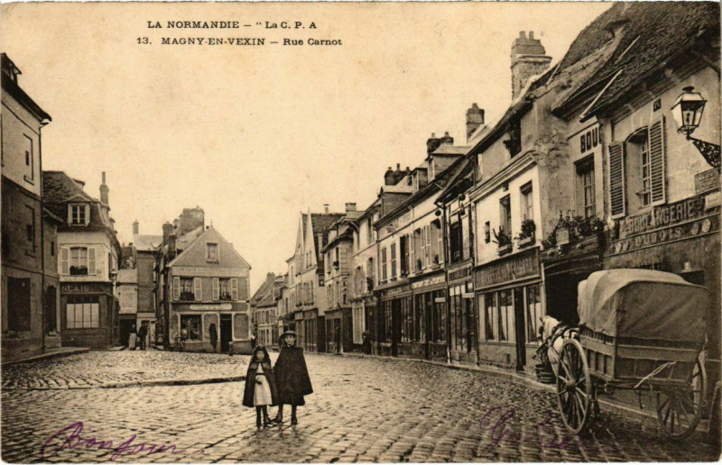 Carte postale ancienne Magny-en-Vexin - Rue Carnot à Magny-en-Vexin