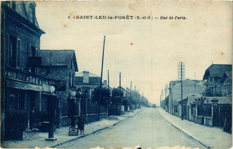 Carte postale ancienne Saint-Leu-la-Forét (S.-et-O.) - Rue de Paris à Saint-Leu-la-Forêt