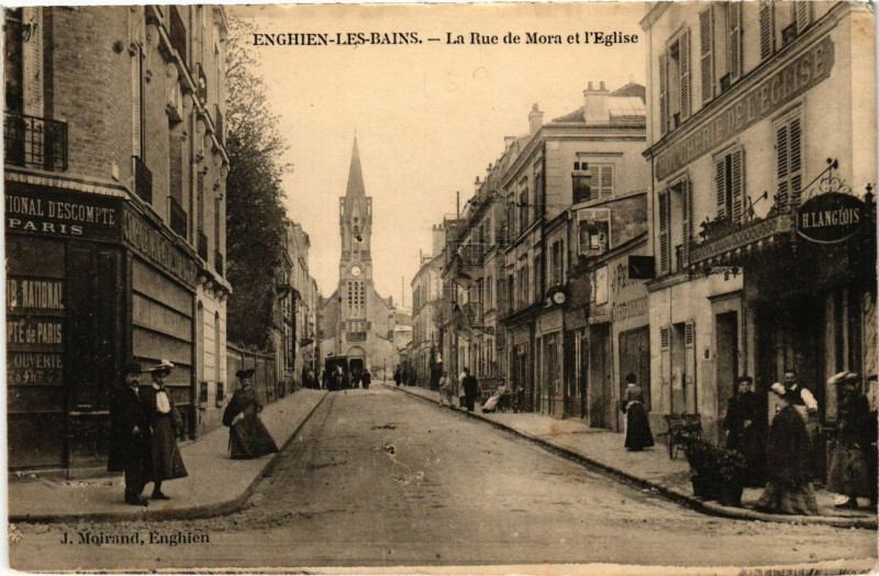 Carte postale ancienne Enghien-les-Bains - La Rue de Mora et l'Eglise à Enghien-les-Bains