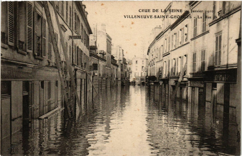 Carte postale ancienne Villeneuve-Saint-Georges - La Rue de Paris à Villeneuve-Saint-Georges
