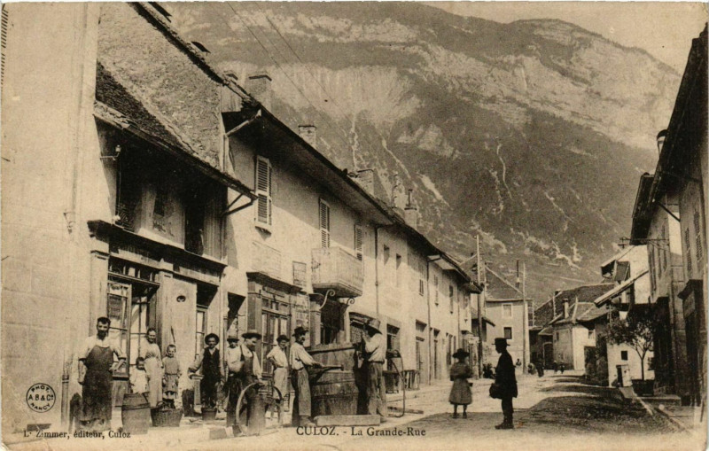 Carte postale ancienne Culoz La Grande Rue à Culoz