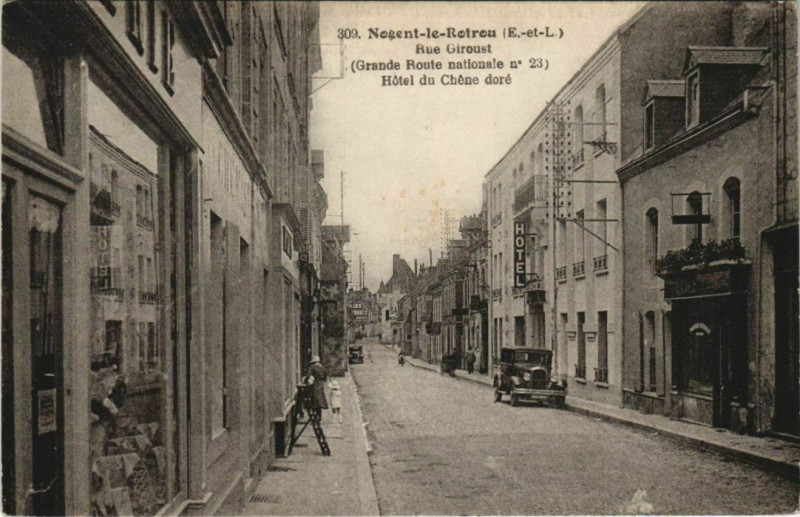 Carte postale ancienne Nogent-le-Rotrou - Rue Giroust (Grande Route nationale à Nogent-le-Rotrou