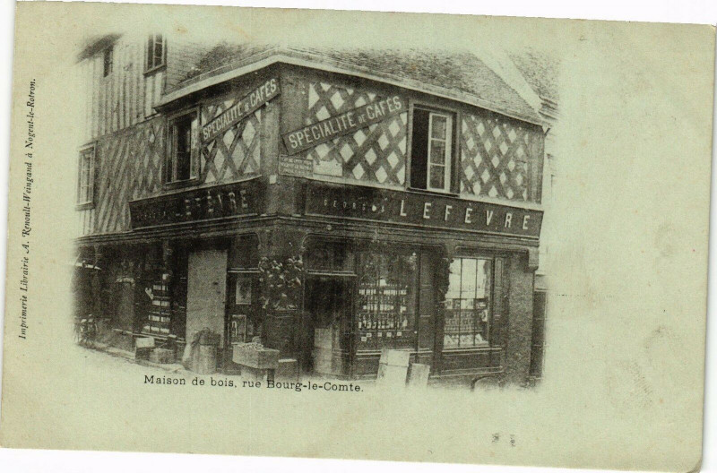Carte postale ancienne Maison de bois rue Bourg-le-Comte