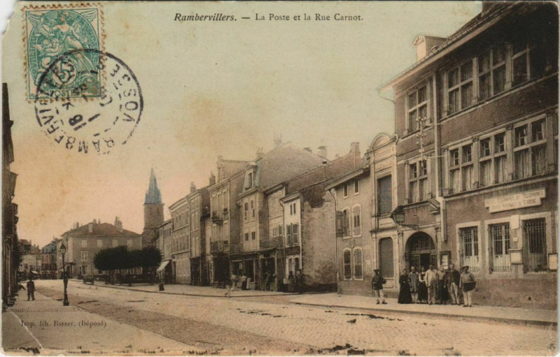 Carte postale ancienne Rambervillers - La poste et la rue carnot à Rambervillers