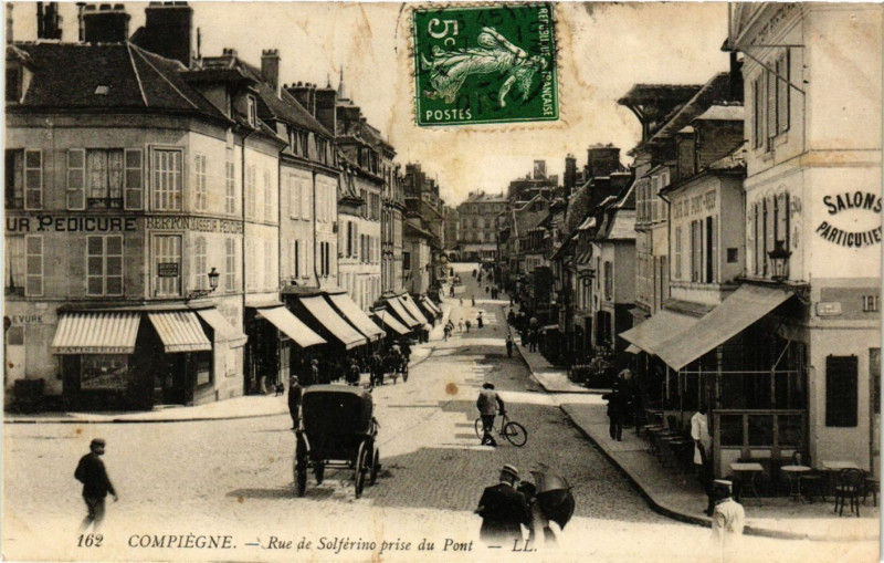 Carte postale ancienne Compiegne - Rue de Solferino prise du Pont à Compiègne