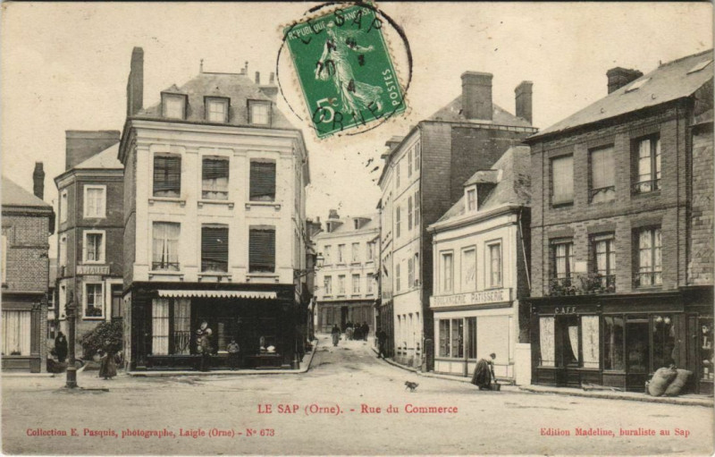 Carte postale ancienne Le Sap - Rue du Commerce