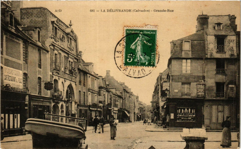 Carte postale ancienne La Delivrande - Grande-Rue