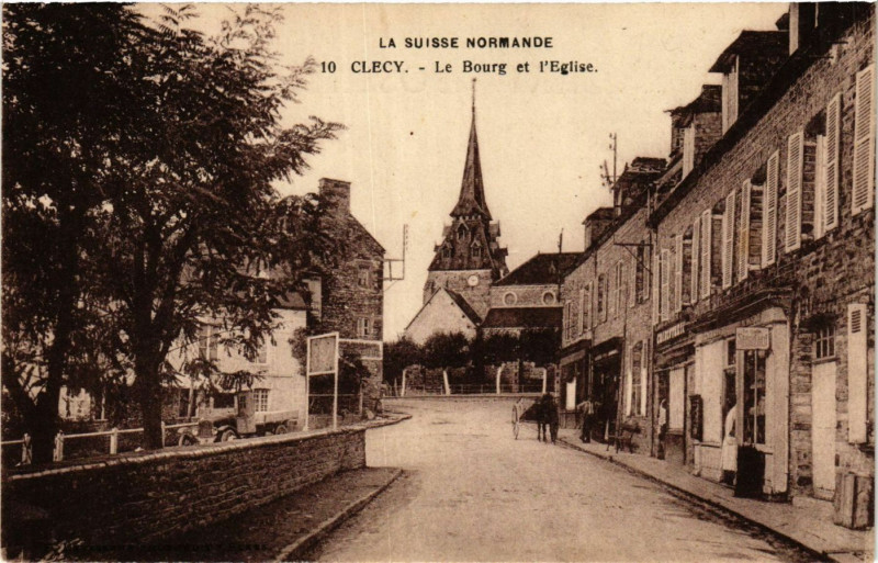 Carte postale ancienne Clecy - Le Bourg et l'Eglise à Clécy