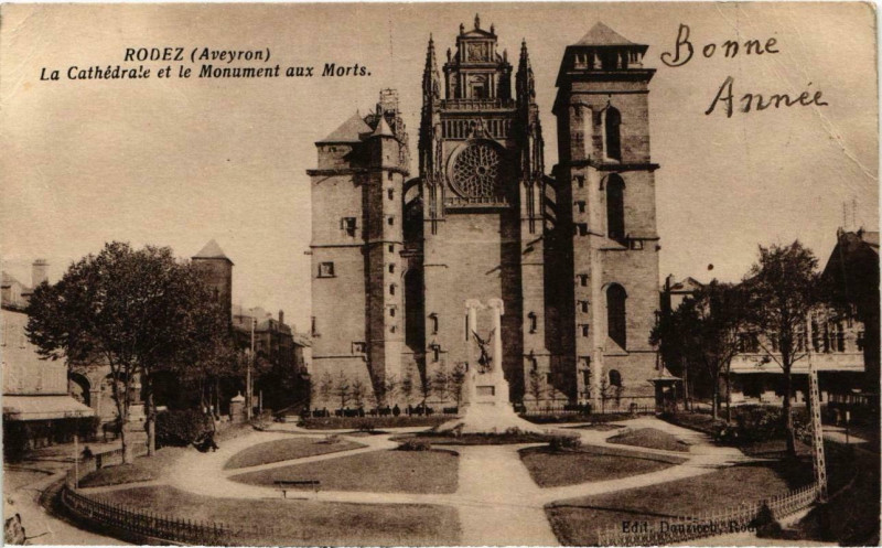 Carte postale ancienne Rodez - La Cathédrale et le Monument aux Morts à Rodez