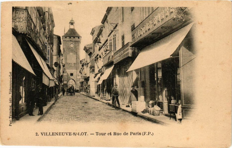 Carte postale ancienne Villeneuve-sur-Lot-Tour et Rue de Paris à Villeneuve-sur-Lot